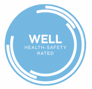 Graphic displaying the WELL Health-Safety Rating seal, earned by Camber for safe, healing-centered environments.