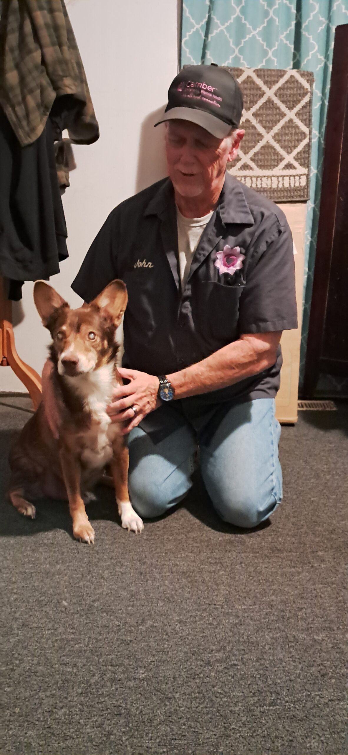 John, Maintenance Supervisor with his dog, Gizmo